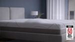 Modern minimalist bedroom featuring innovative mattress design with calming neutral tones.