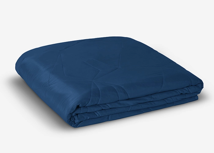 Luxurious navy blue blanket with smooth surface, perfect for cozy home comfort.