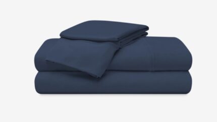 Navy blue luxury bed linens set for a relaxing and sophisticated sleep experience.