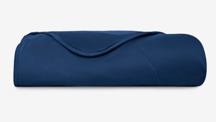 Navy blue plush blanket, soft and stylish for warmth and comfort.
