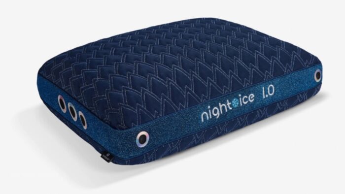 Modern navy pillow with cooling vents, geometric design, optimal for stylish and comfortable sleep.