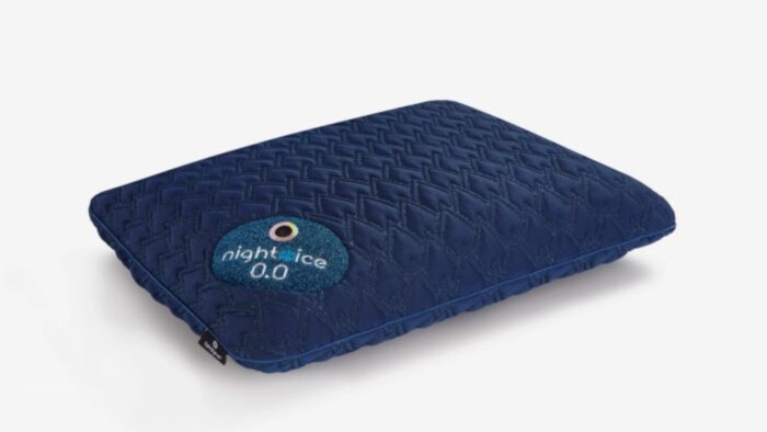 Dark blue quilted pillow with night ice 0.0 logo on white background, suggesting cooling features.