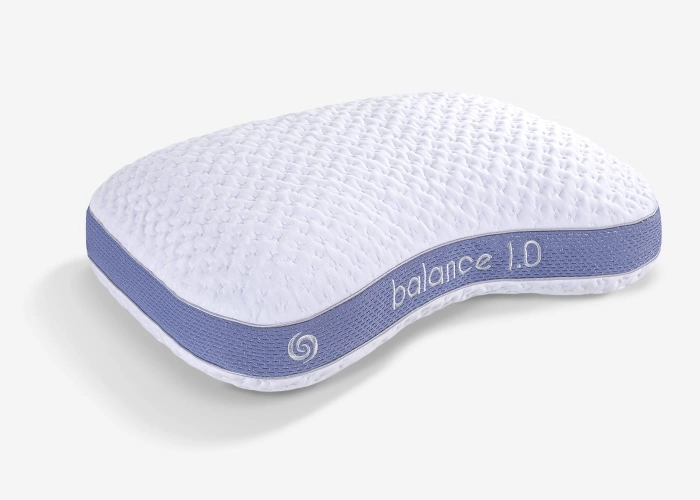 Contoured ergonomic pillow with lavender accents for enhanced sleep posture and comfort.