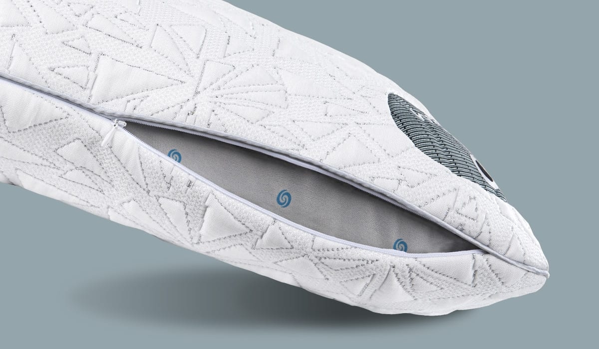 Modern ergonomic gray pillow with geometric quilted pattern, adjustable firmness, and stylish branding.