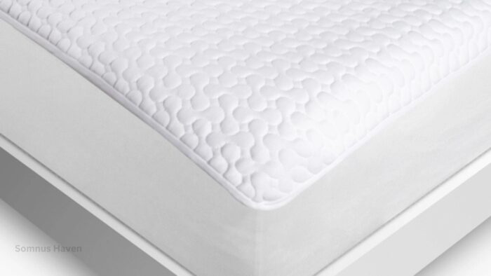 Luxurious white quilted mattress topper for optimal comfort and temperature regulation.