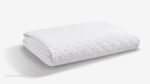 White textured blanket for decor, offering elegance and warmth in any room.