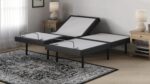 Modern split adjustable bed frame in bright bedroom, independent sections, minimalist design.