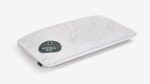 Sleek Storm Pillow: white, geometric pattern, black label, modern comfort for side/back sleepers.