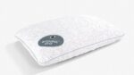 Modern geometric white pillow for comfort and style, featuring STORM 0.0 branding.