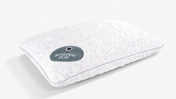 Modern geometric white pillow for comfort and style, featuring STORM 0.0 branding.