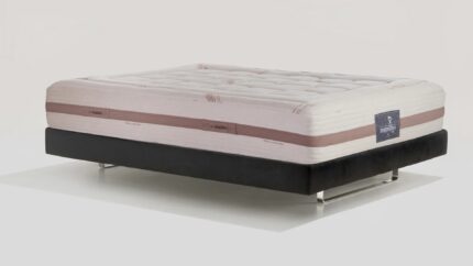Luxury cream mattress with elegant stitched design and modern base for comfort and style.