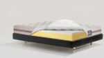 Modern luxury foam mattress with plush quilted top and supportive foam layer on sleek base.