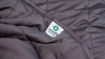 Luxurious gray weighted blanket with quilting, promoting relaxation and improved sleep quality.