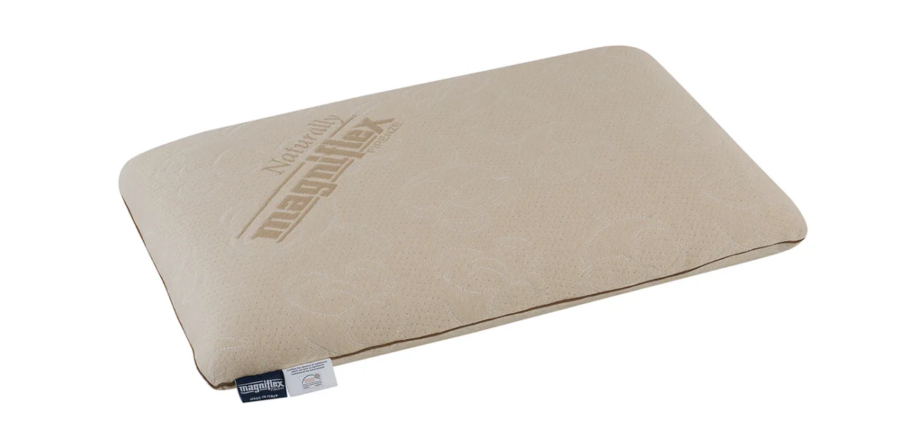 Chic beige pillow with plush comfort, rounded edges, embossed brand, perfect for versatile decor.