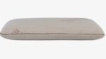 Minimalist beige pillow with subtle embossed patterns, perfect for modern decor and comfort.