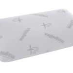 Magniflex ergonomic pillow: minimalist, supportive design with breathable, soft fabric for restful sleep.