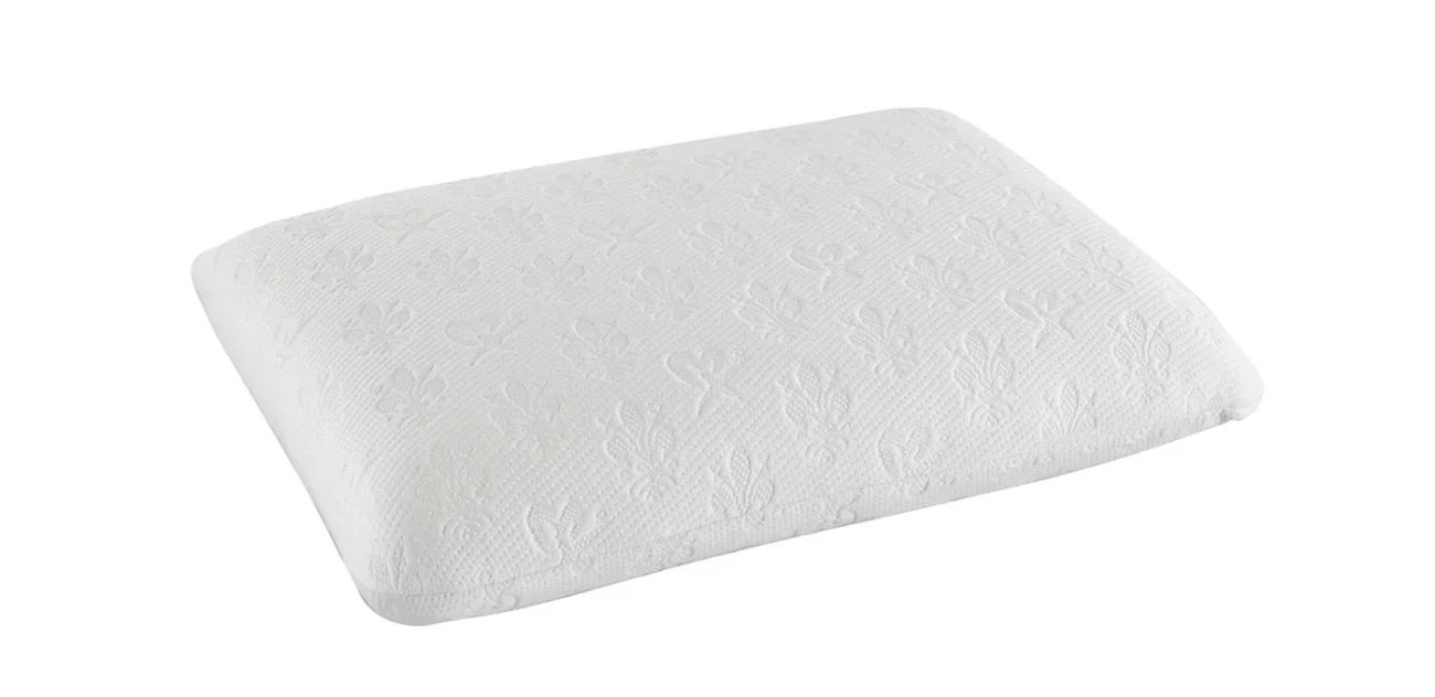 Ergonomic white pillow with floral motifs for neck support and elegant bedroom decor.