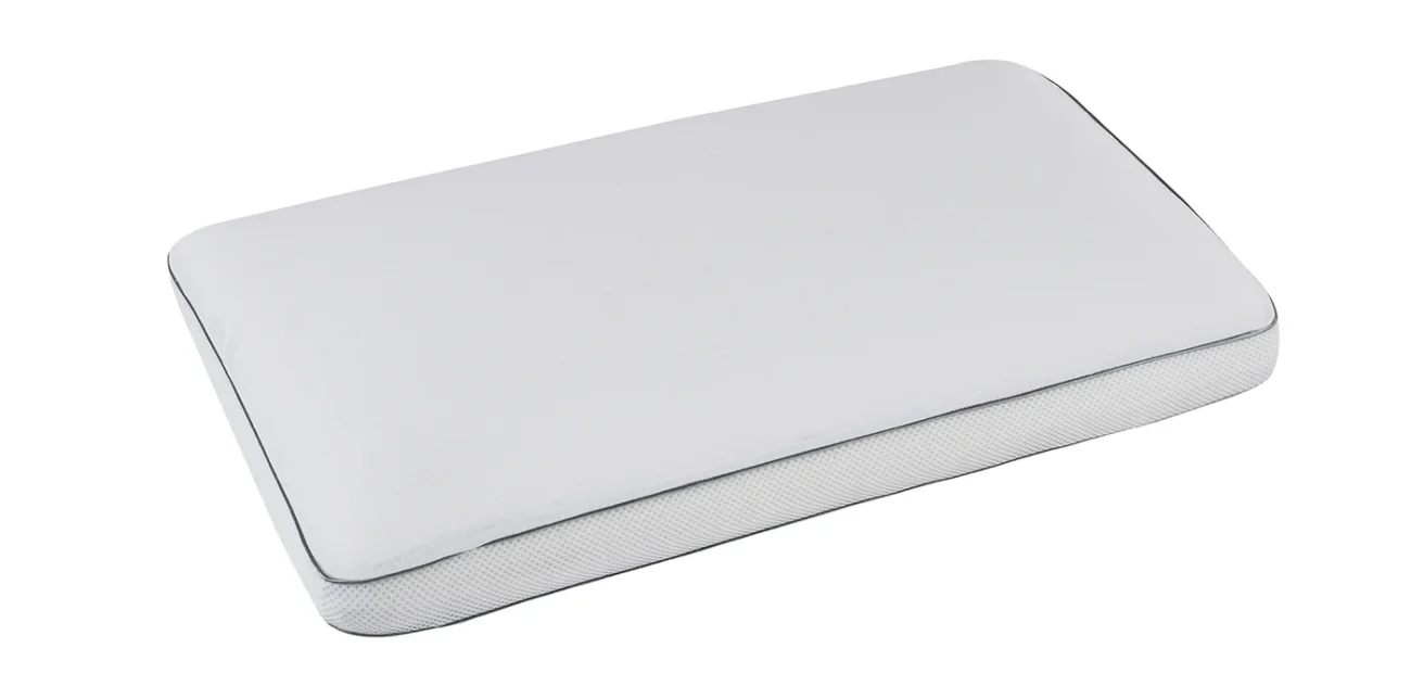 Elegant white rectangular pillow with contrasting trim for versatile home decor.